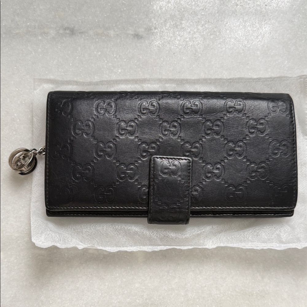 Gucci Embossed Black Leather Clutch